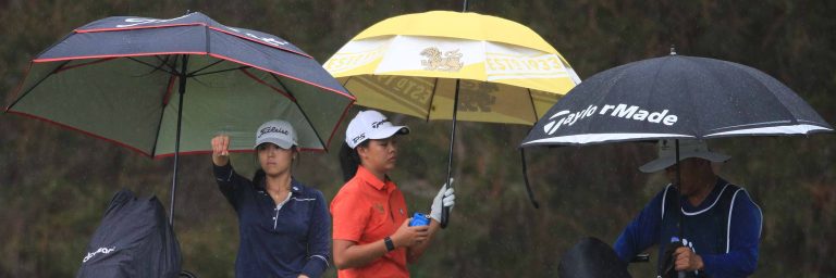 players under umbrella